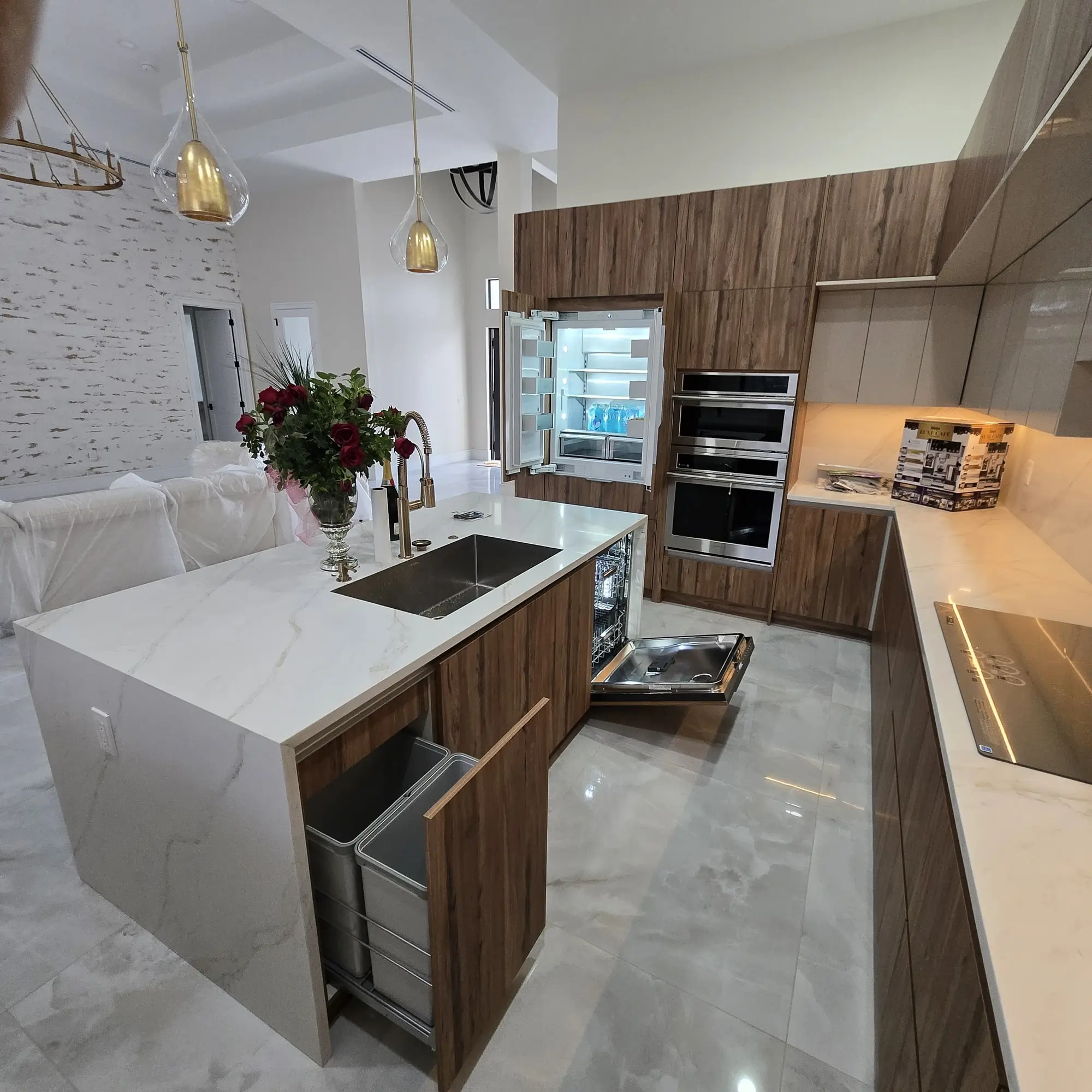 Custom walnut kitchen island with open integrated storage drawers