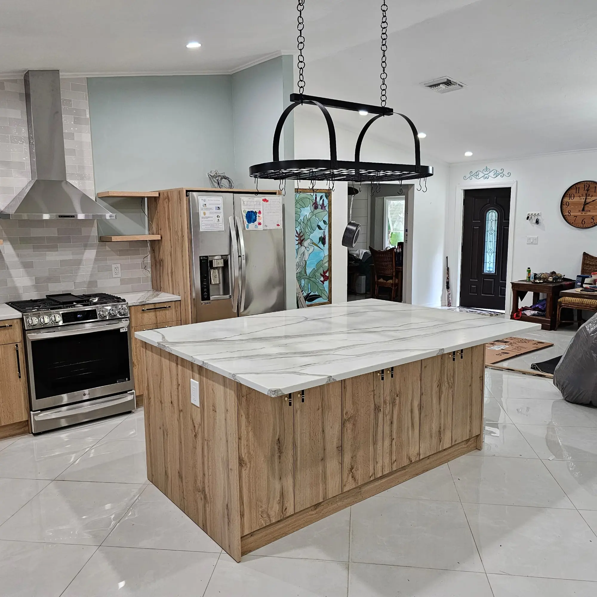 Natural oak kitchen with stone island and custom cabinetry