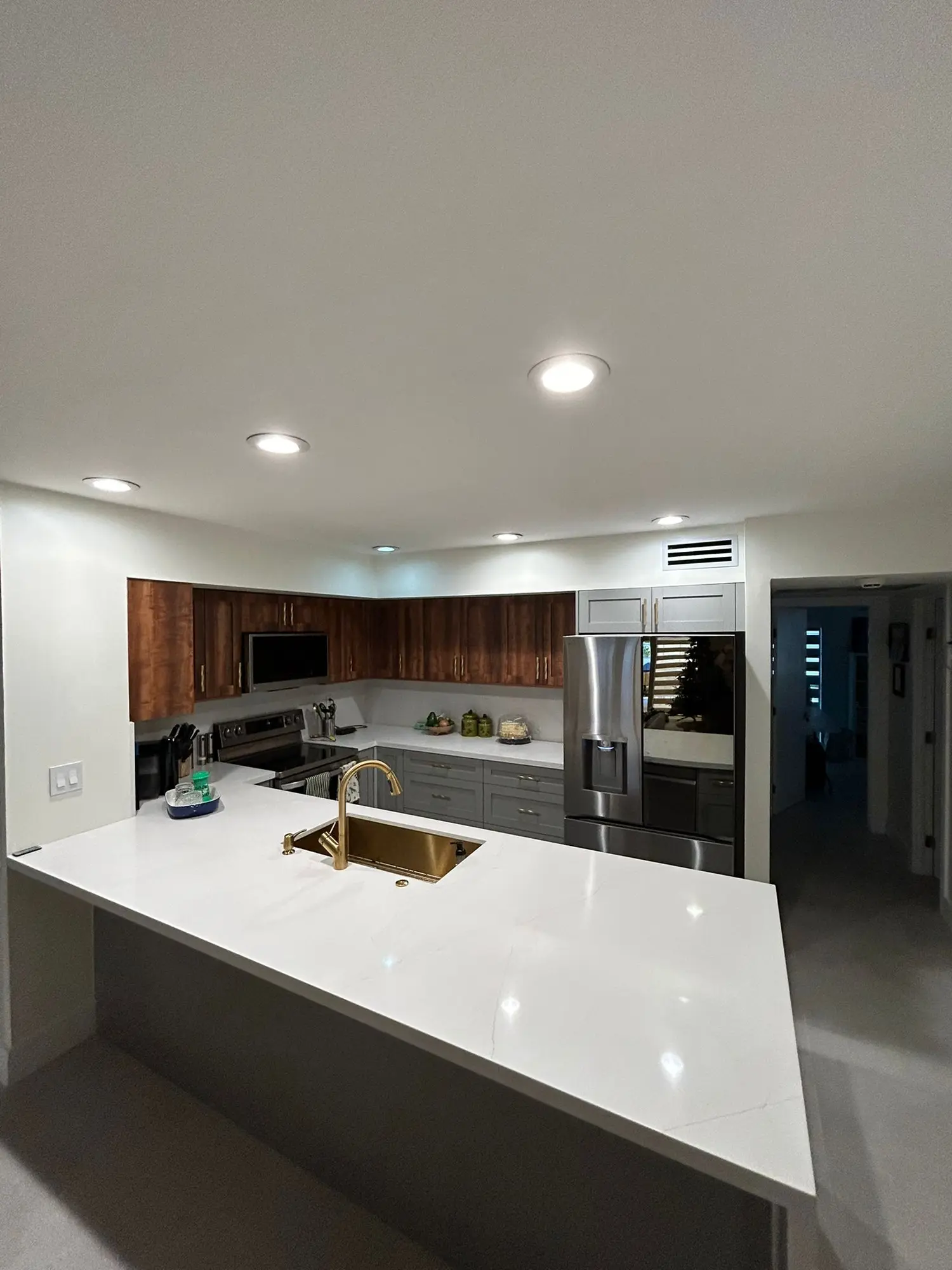 White and charcoal custom kitchen with large island